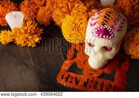 Sugar Skull With Candles, Cempasuchil Flowers Or Marigold And Papel Picado. Decoration Traditionally