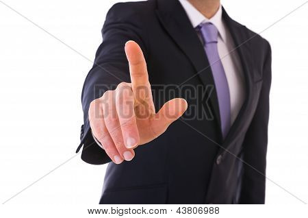 Businessman touching an imaginary screen.