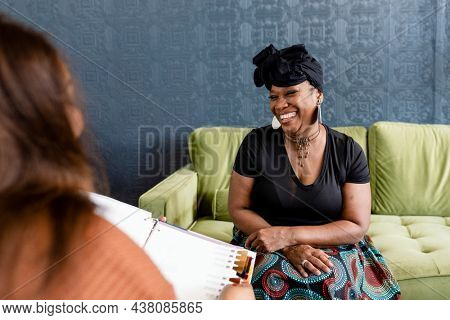 Woman selecting her new hair with the beauty consultant