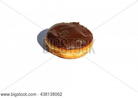 Donut. Donut on white. Isolated on white. Room for text. Cream Filled Chocolate Covered Donut. Bavarian Cream Filled donut.