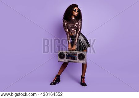 Photo Of Lady Hold Radio Look Empty Space Wear Retro Glasses Glossy Shirt Short Skirt Isolated Purpl