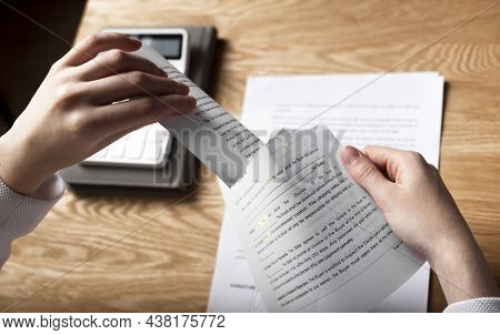 Contract Terminated Concept. Hands Breaching And Ripping Legal Business Agreement.