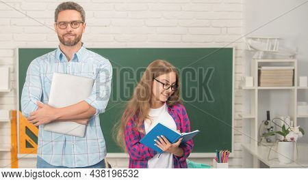 Kid And Dad In Classroom With Copybook And Computer At Blackboard, Estudy
