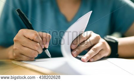 Close Up Image Of Person With Pen Signing Contract At Desk, Conclusion Of Agreement With Business Do
