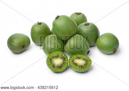 Fresh whole and halved kiwi berries close up isolated on white background 