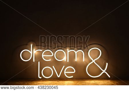 White Neon Sign With The Inscription Dream Love. Trendy Style. Wedding Design. Neon Sign. Custom Neo