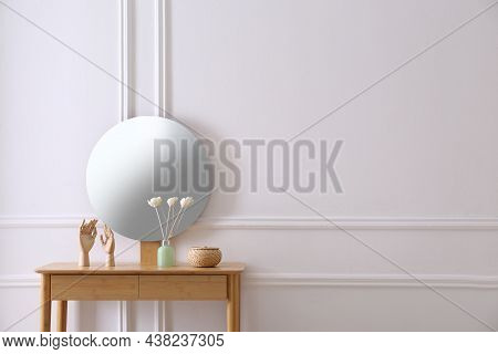 Air Reed Freshener And Decor On Console Table Near White Wall With Mirror Indoors, Space For Text. I