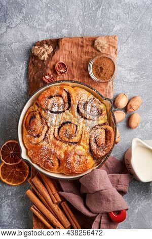 Cinnabon Cinnamon Rolls Buns With Pumpkin, Nut, Caramel And Sugar Cream Iced. Top View. Sweet Homema