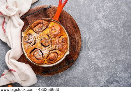 Cinnabon Cinnamon Rolls Buns With Pumpkin, Nut, Caramel And Sugar Cream Iced. Top View. Sweet Homema