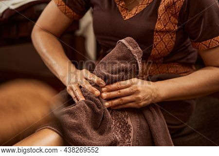Licensed Reflexologist Is Giving Patient Reflexology Massage