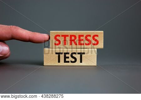 Stress Test Symbol. Concept Words Stress Test On Wooden Blocks On A Beautiful Grey Background. Busin