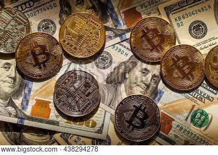 Golden Bitcoin Lies On The Banknotes.new Virtual Money. Crypto Currency Top View. Real Coins Of Bitc