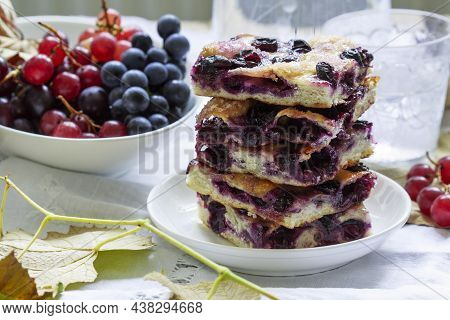 Traditional Italian Yeast Dough Pie With Grapes Schiacciata And Bunches Of Grapes On A Light Backgro