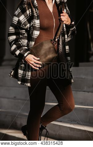 Outdoor Fashion Portrait Of Young Fashionable Girl Wearing Trendy Checkered Shirt, Solid Long Sleeve