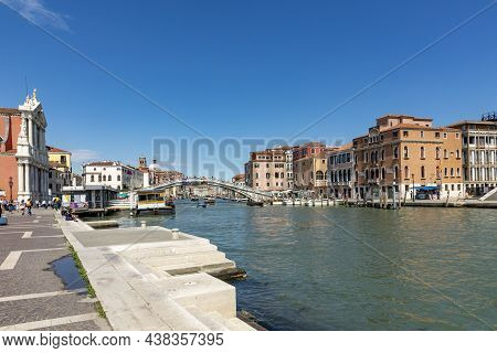 Venice, Italy - July 2, 2021: People Crossing Grand Canal At Ponte Degli Scalzi Near Luca Railway St