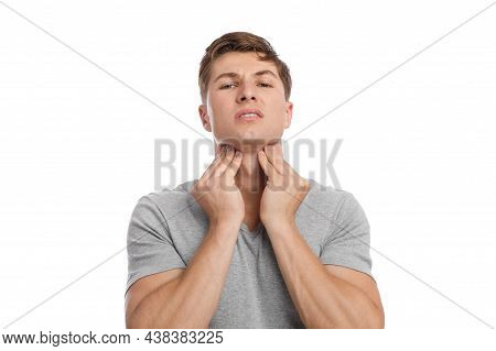 Unhappy Young European Handsome Guy Presses Hands To Throat, Suffers From Tonsil Pain