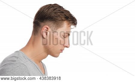 Calm Sad Serious Millennial Caucasian Attractive Male Suffering From Pain, Isolated On White Backgro
