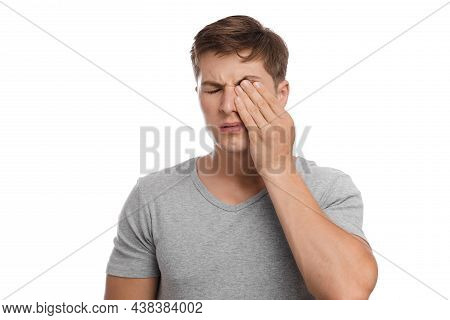 Sad Tired Unhappy Millennial European Attractive Man Rubs Eye, Suffers From Pain And Dryness