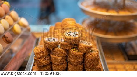 Oriental Sweets, Baklava. Sweet Food, Dry Fruit, Baklava And Oriental Pastry Roll In Bazaar At Histo