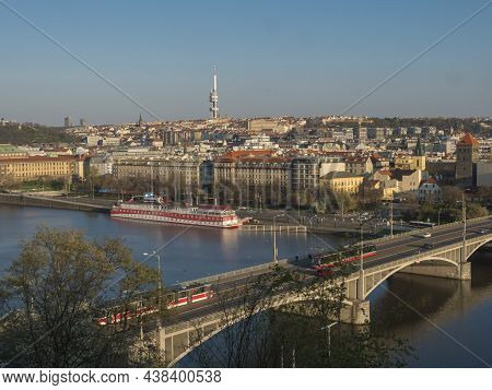 Scenic Aerial View Of Prague Old And New Town Architecture Roof Top And Manes Bridge Over Vltava Riv