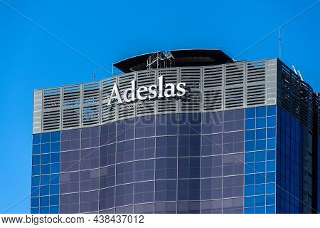 Madrid, Spain - September 12, 2021: Adeslas Health Company Signage On Top Of Skyscraper