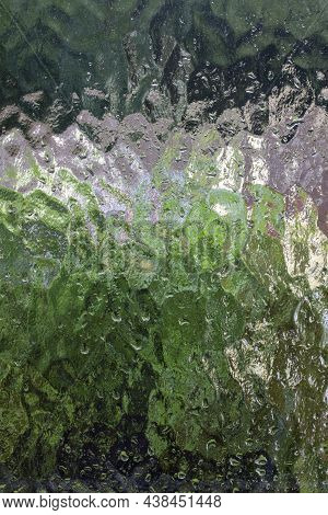 Nature Viewed Through Frosted Glass On A Rainy And Windy Day. Image Created During A Power Cut On Th