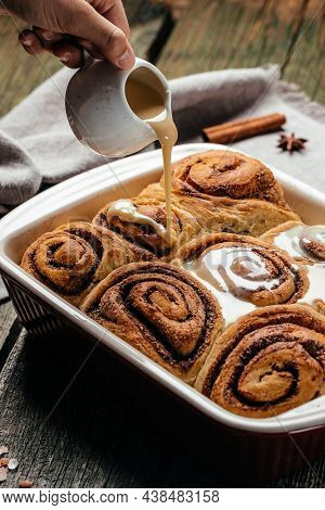 Sinnabon Buns Rolls With Vanilla Cream. Sweet Traditional Dessert Buns.