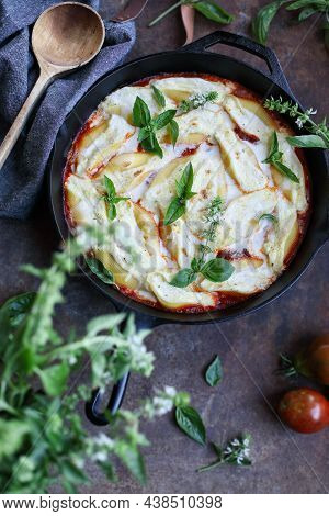 Overhead Of Conchigliei, Stuffed Pasta Shells, With Ricotta Cheese, Mozerella And Basil Leaves In A 