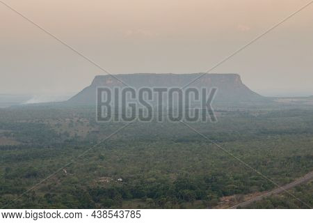 Fire And Smoke Blot Out The View Of Morro Do Chapeu In Chapadas Das Mesas In Maranhao Brazil