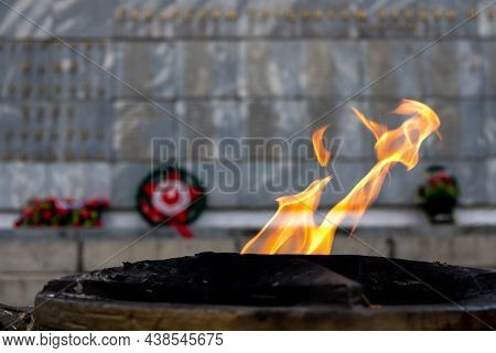 The Eternal Fire Burns And Develops In The Wind. In Memory Of The Fallen Wars In The War