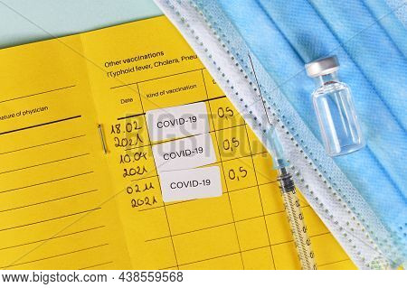 Concept For Corina Virus Booster Vaccination Showing Vaccine Passport With 3 Entries