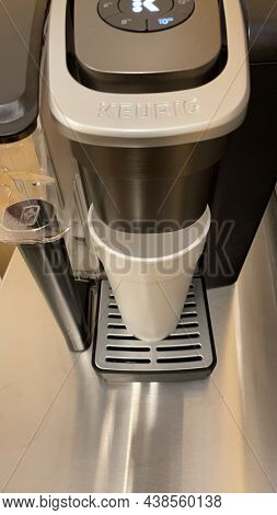 Looking Down At A K Cup Coffee Maker And Cup