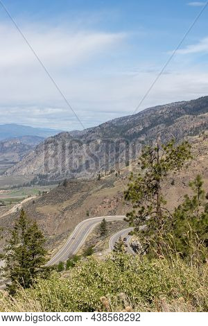 Winding Mountain Pass Through In The Okanagan Valley In Osoyoos, British Columbia On A Spring Day