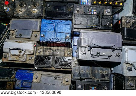 Top View Of Many Used Car Batteries Waiting To Be Recycled In An Environmentally Harmful Scrap Yard