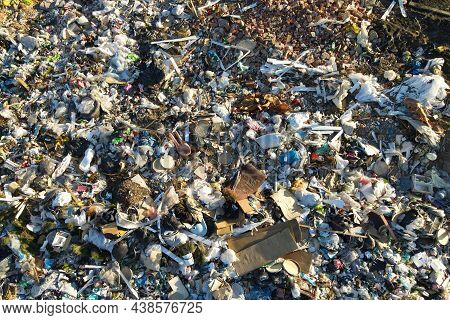 Garbage Dump With Plastic Bags And Food Waste. Recycling Of Waste On Junk Yard. Dispose The Rubbish 