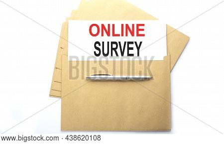 Text Online Survy On Paper On Envelope On White Background