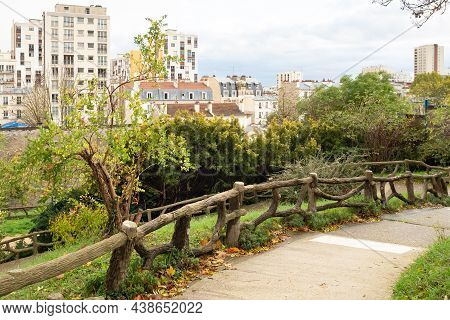 Paris, France - November 3rd 2019: A Small Green Island In The City Landscape - Square Henri-karcher