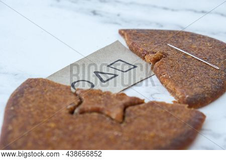 Kiev Ukraine - October 2021 Squid Game Invitation Card Star Shape Homemade Sugar Candy. Playing Kore