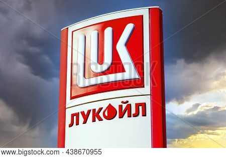 Saint Petersburg, Russia - August 10, 2018: Lukoil Dealership Sign Against A Blue Sky. Lukoil Is One