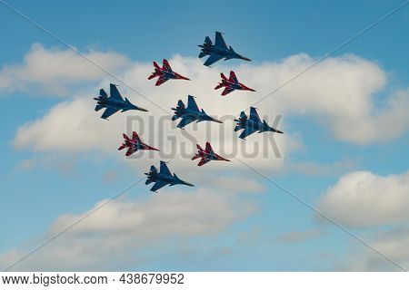 Moscow, Russia - May, 09, 2021: Diamond-shape Of 4 Mig-29 The Russian Knights And 5 Su-27 Swifts In 