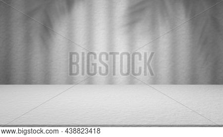 Empty Studio Room Gray Cement With Shadow Palm Or Coconut Leaves Background. Blank Table Old Grunge 