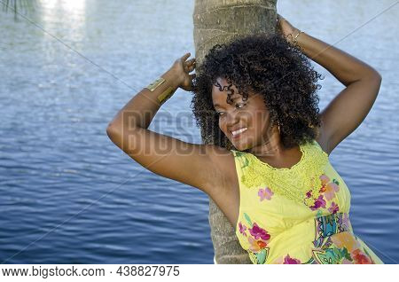 Beautiful Model Wearing Yellow Dress.