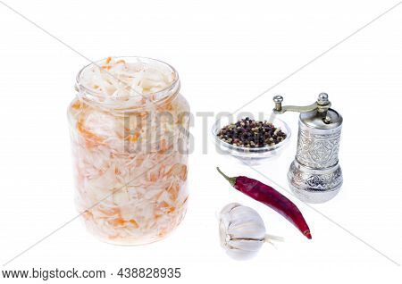 Sauerkraut In Glass Jar On White. Studio Photo.