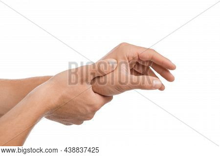Young European Guy Massaging Hand And Suffering From Pain In Wrist, Isolated On White Background, Cl