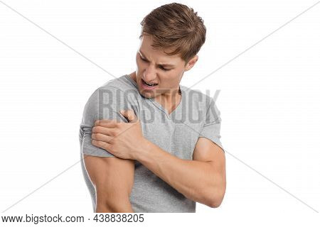 Despaired Sad Millennial Caucasian Attractive Man Presses His Hand To Sore Spot And Suffers From Sho