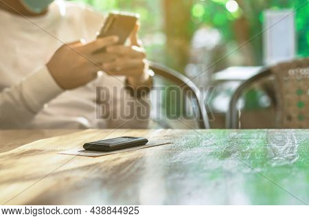 Queue Wireless Calling System Restaurant Or Pager Customers System With Invoice On Table With Blur I