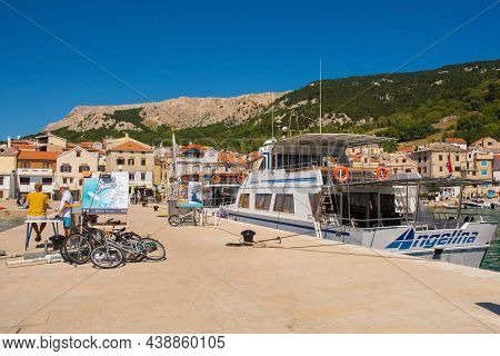 Baska, Croatia - 4th September 2021. Boat Trip Sellers Wait For Customers On A Pier In The South Krk