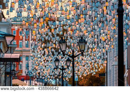 Street Lights On Stoleshnikov Lane. Moscow Pedestrian Street. Lights In The Dark. Beautiful Backligh