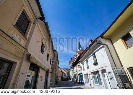 Kranj, Slovenia - June 15, 2021: Medieval Narrow Street Of Cankarjeva Ulica In Staro Mestno Jedro, T