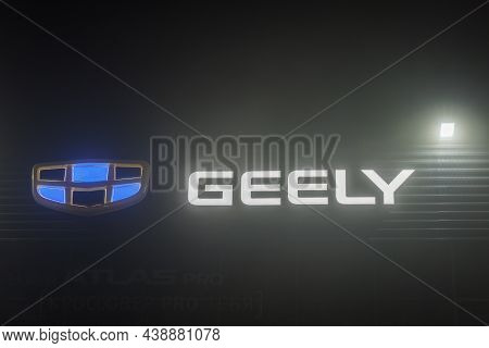 Geely Logo On Car Dealership Building At Foggy Night - Geely Is One Of The Largest Chinese Automobil